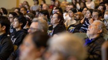 Audience listening to Professor Geschwind